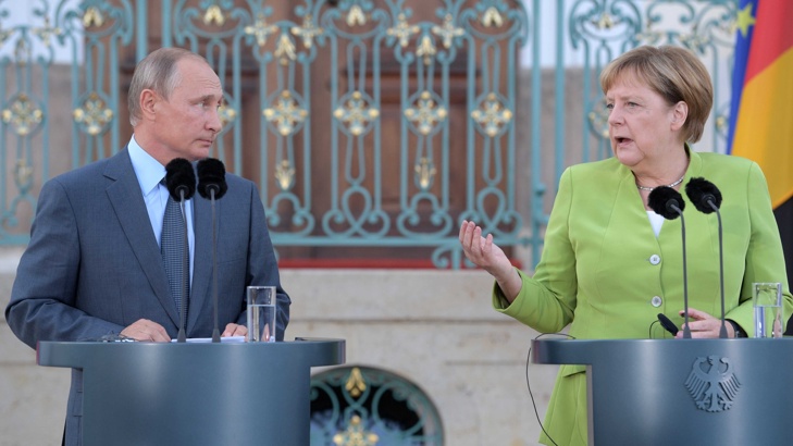 Срещата Путин Меркел 34 Сверяване на часовниците 34 зад закритити вратиРуският президент Владимир