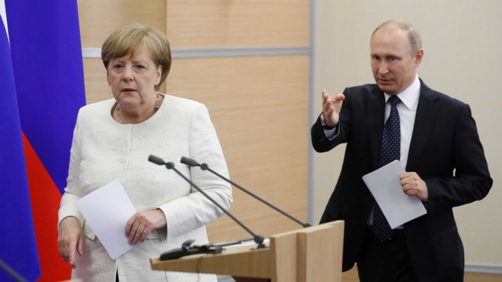 Меркел с Путин. 