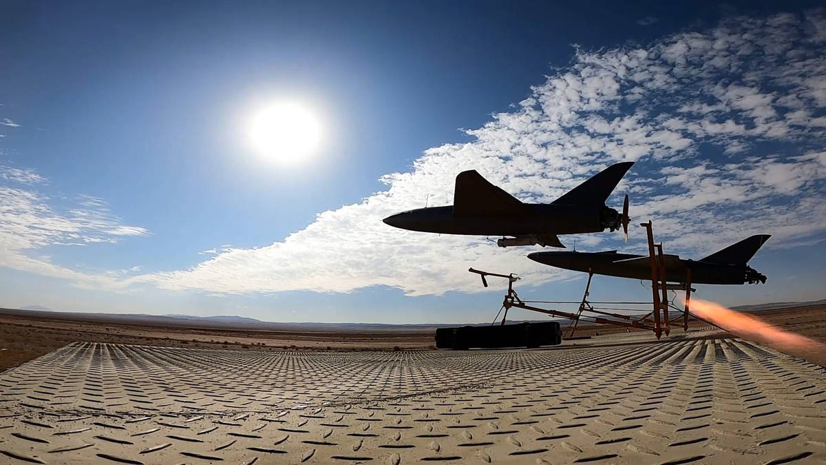 Iran unveils drones armed with air-to-air missiles