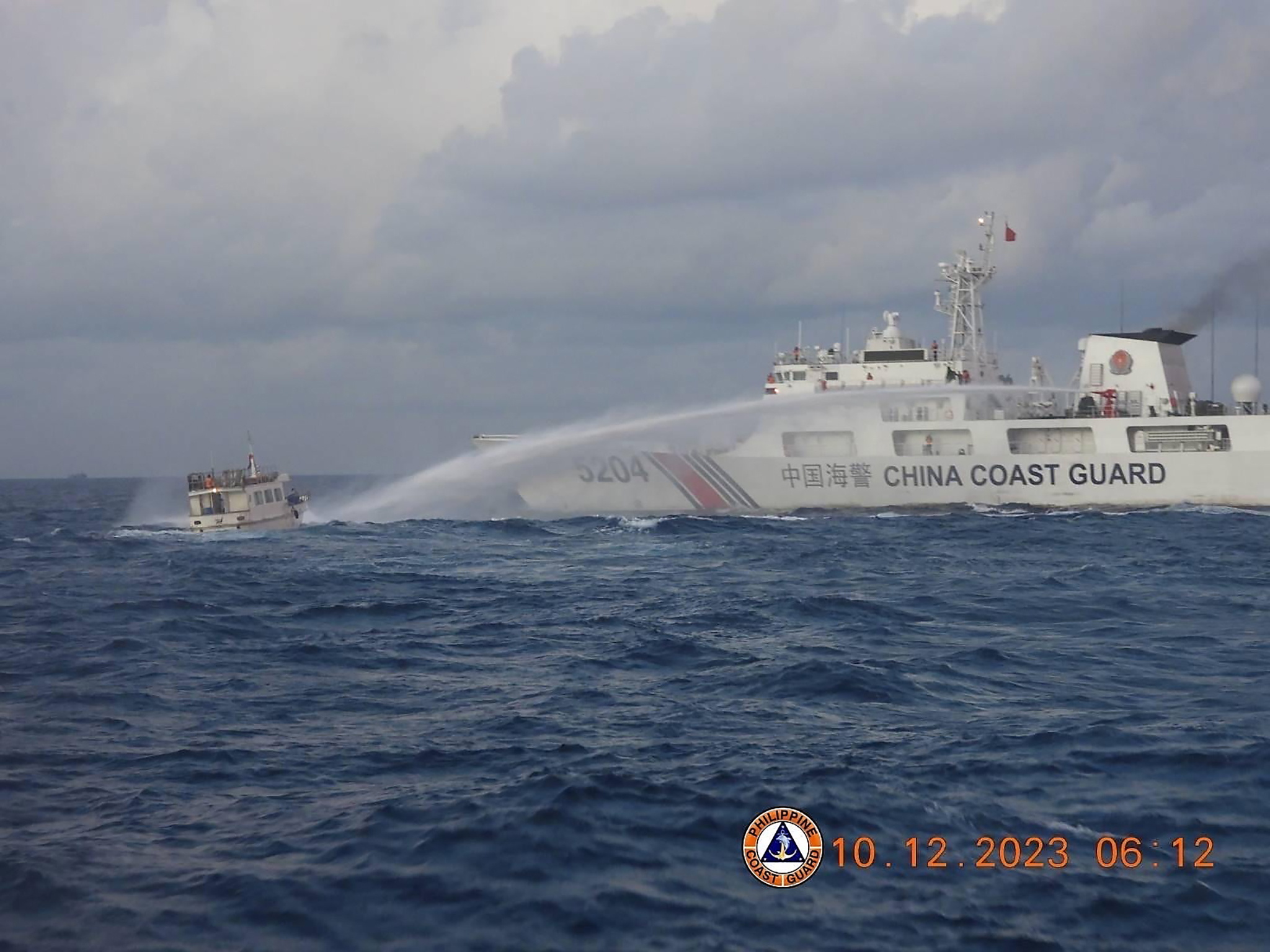 The US has called on Beijing to end its "dangerous" behavior in the South China Sea