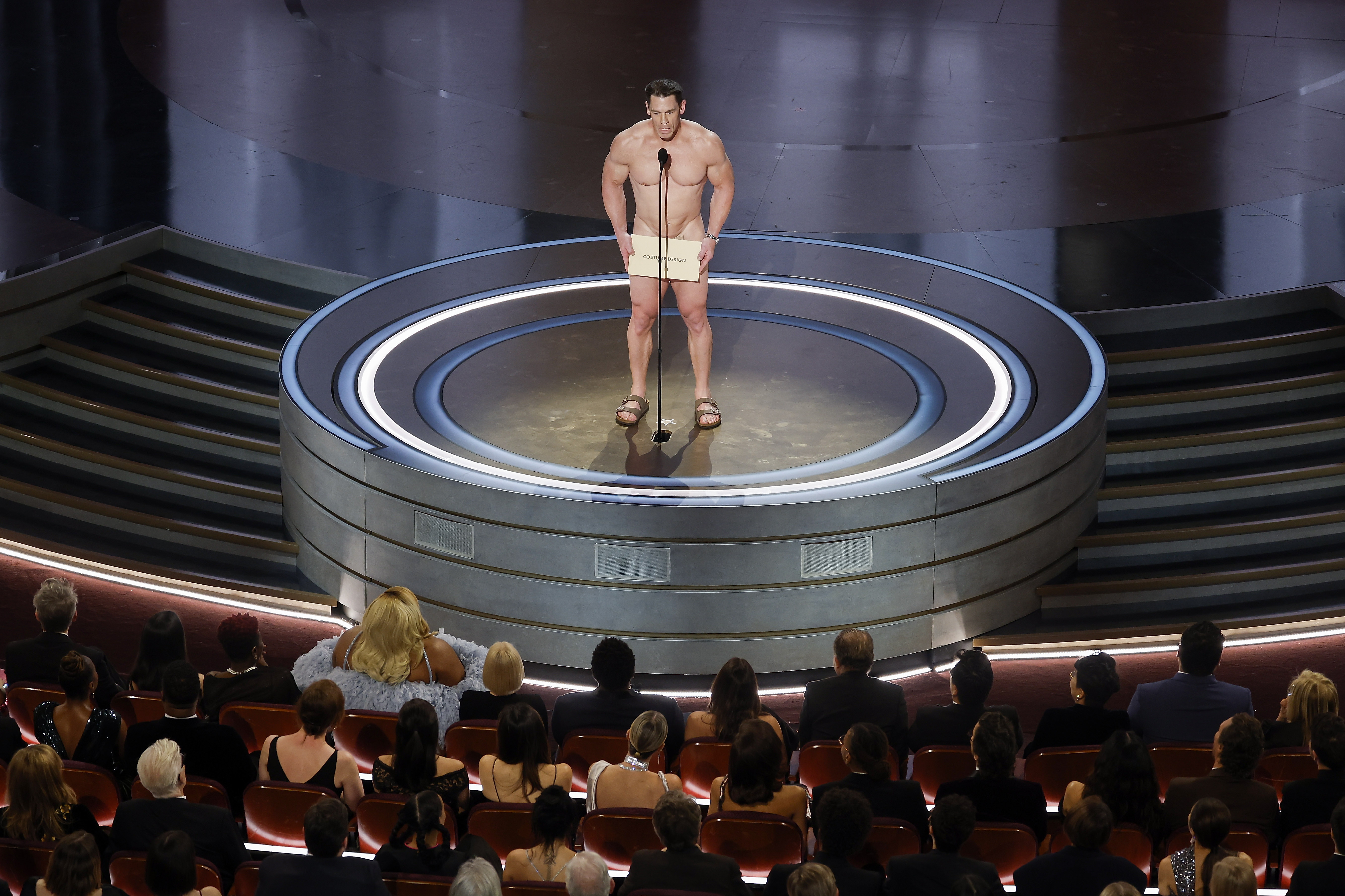 John Cena presented the "Oscar" for best costumes completely naked