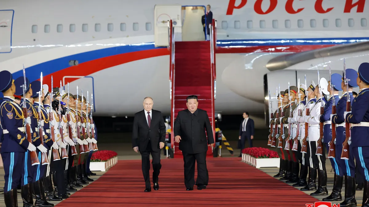 Red carpet and hug for Putin in North Korea