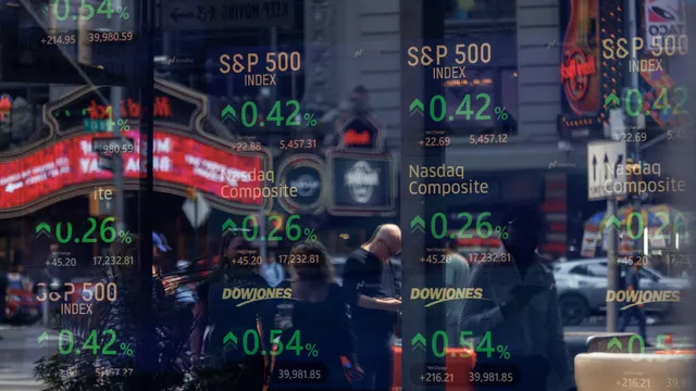 Nasdaq hits new record as Dow and S&P 500 decline