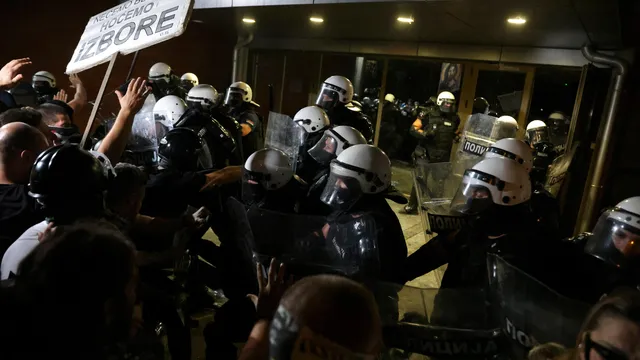 Dozens injured after police attacked protesters in the Serbian city of Novi Sad with batons and stun grenades 